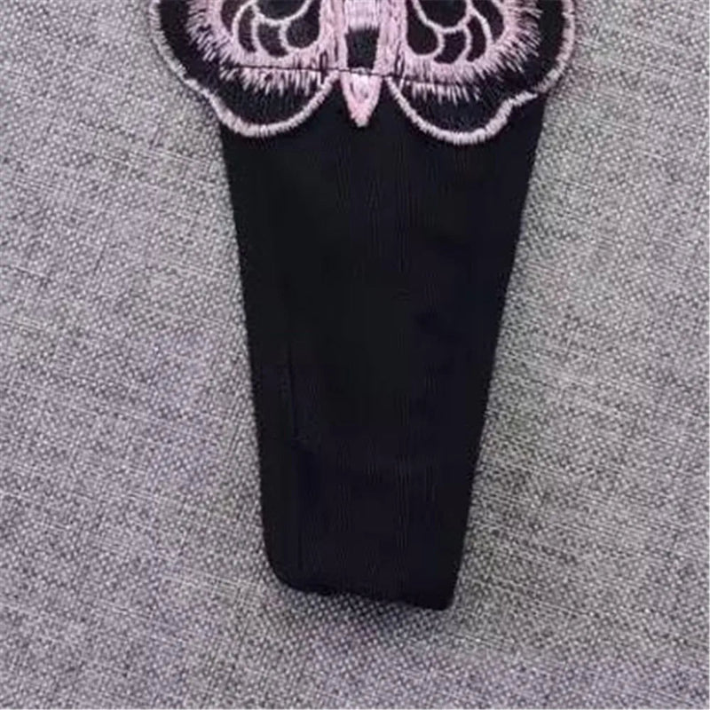 String dentelle papillon noir