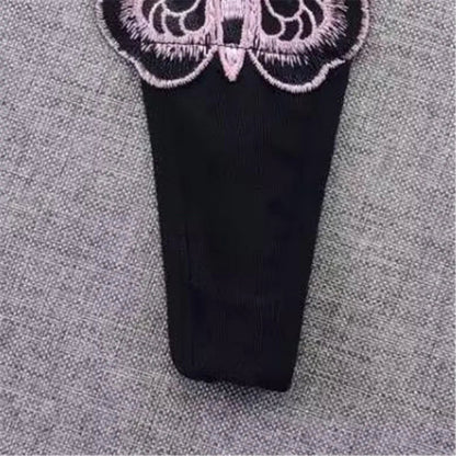 String dentelle papillon noir